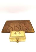 A 19th Century Indian brass lockable spice box and craved hardwood elephant design panel. L.16 D.