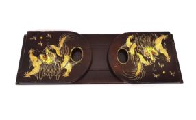 A Chinese gilded and lacquered book slide, each end depicting a Chinese dragon chasing the pearl. (