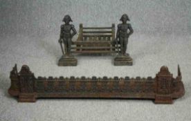 A C.1900 cast iron fire basket, H.40 W.58 D.50cm along with a similar fire kerb. W.113cm.