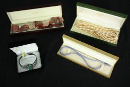 A collection of jewellery, including a Jasper bead necklace, faux pearl necklaces, a Tanzanite
