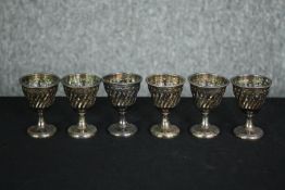 A set of six 19th century pierced silver plated egg cups. H.7cm. (each)