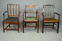 Two Georgian mahogany armchairs and a later similar chair.