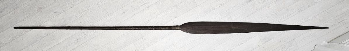 A long carved tribal spear. L.295cm.