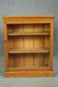 A 19th century pine dwarf bookcase. H.86 W.70 D.27cm.