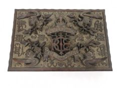 An early 20th century carved hard wood Chinese cigar box. Decorated with heraldic shield and motto