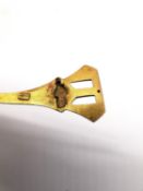 An Art Noveau 18ct yellow gold pin brooch with sugar loaf sapphire. Stamped 750. (missing pin