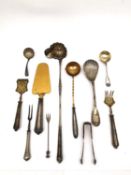 A collection of silver and silver plate, to include a silver punch ladle, a shell design caddy