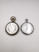 A Victorian white metal Remontoir 10 rubis pocket watch with white enamel dial and black roman