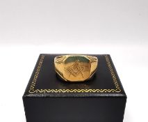 An early 20th century 9ct yellow gold masonic signet ring by Marple's and Co with engraved square
