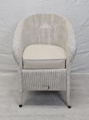 A vintage Lloyd Loom tub armchair.