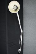 An anglepoise lamp with desk clamp fitting. H.130cm.