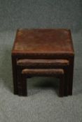 An unusual nest of three oak framed footstools. H.42 W.48 D.48cm. (largest)