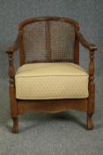 A child's mid century tub armchair. H.69cm.