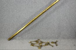A long vintage brass curtain rail and brackets (and one end cap only). L.410cm.