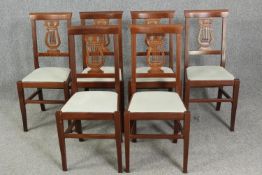 Dining chairs a set of six Continental style in fruitwood.