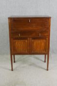 A mahogany cocktail cabinet, 20th century, in late Georgian style. H.122 W.88 D.48cm.