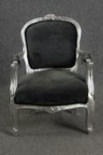 A small Louis XV style silver painted child's armchair. H.67cm.