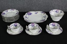 A Collingwood porcelain part tea service. Dia.27cm. (largest).