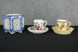 A Chinese blue and white pierced censer with prunus design along with a Japanese cup and saucer