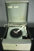 A vintage portable turntable / record player, Garrard in a Bush case. H.24 W.38 D.44cm.