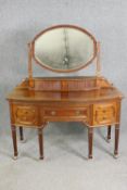 A George III style walnut dressing table, 20th century. H.164 W.136 D.63cm.