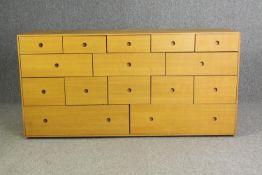 A contemporary light oak chest of drawers, H.73 W.150 D.48cm.