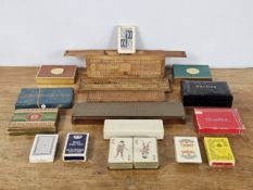 A group of vintage games, including cribbage boards, cards & dominoes