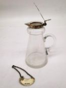 An early 20th century silver topped whiskey noggin by Asprey & Co Ltd with silver decanter label