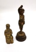 A 19th century gilt bronze putti on ebonised base along with brass seated Buddha. Tallest 14cm.
