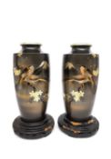 A pair of Showa period mixed metal vases with song birds on blossom branches with mount Fuji in