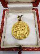 A leather boxed 9ct yellow gold St. Christopher medallion by Paul Vincze. Medallion signed P.