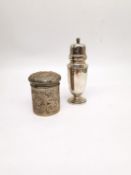 An Art Deco silver sugar sifter by Walker & Hall and a repousse silver dressing table pot with