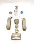 A glass dressing table set with silver tops, to include jars, a perfume bottle with enamelled cap