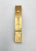 A 1940s Pery Watch Co. yellow metal (tests as 9ct) manual wind timepiece set within an engine turned