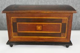A 19th century fruitwood parquetry inlaid box. H.13 W.22 D.10.5cm.