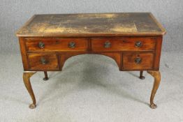 A George II style mahogany writing desk, with a worn leather top. H.76 W.123 D.66cm.