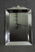 A contemporary Venetian style wall mirror, H.137 W.86cm.