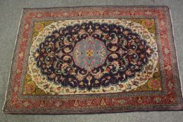 A Tabriz style rug, 20th century. L.155 W.106cm.