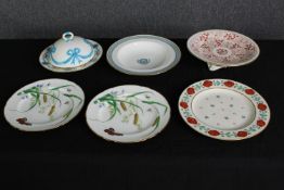A group of six various 19th century porcelain plates, a cake stand and a cheese dish, including