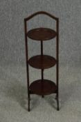 An Edwardian mahogany three tier mahogany cakestand. H.84cm.