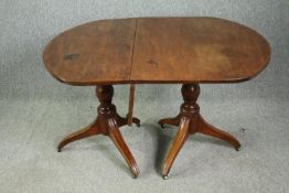 A late Georgian pedestal 'D' end mahogany dining table, with drop flap central leaf. H.73 W.144(ext)