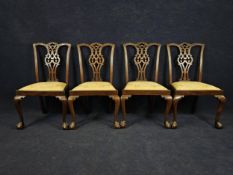 A set of four George II style mahogany dining chairs, 20th century. H.98cm.