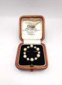 An antique leather boxed French yellow and white metal (tests as 18ct gold) old cut diamond and