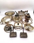 A collection of silver plate, to include two table lighters, two warmers, a tankard, cocktail shaker