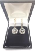 A pair of Victorian yellow metal (tested as 9ct) and old cut diamond cluster drop earrings. The pair