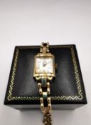 A Roamer ladies automatic vintage 9ct gold wrist watch with ladder link articulated bracelet with