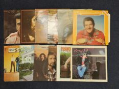 Collection of modern country records including albums by Conway Twitty, Waylon Jennings, Ronnie