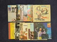 A mixture of Jazz and Worlds Music including albums by Louis Armstrong, Buddy Greco and Charlie