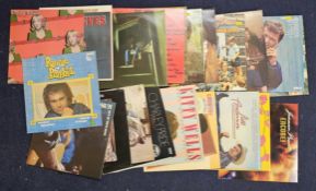 A selection of Country Music albums including records by Kitty Wells and Ronnie Prophet. (21)