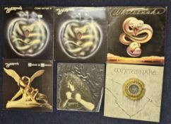 A selection of Whitesnake records including a shaped picture disc and 5 long playing albums of Heavy